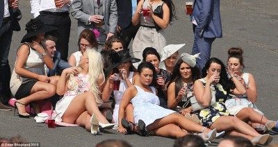 276D711100000578-3033363-Sunbathing_Ladies_huddle_on_a_tarmac_concourse_as_they_enjoy_a_d-m-294_1428673573051.jpg